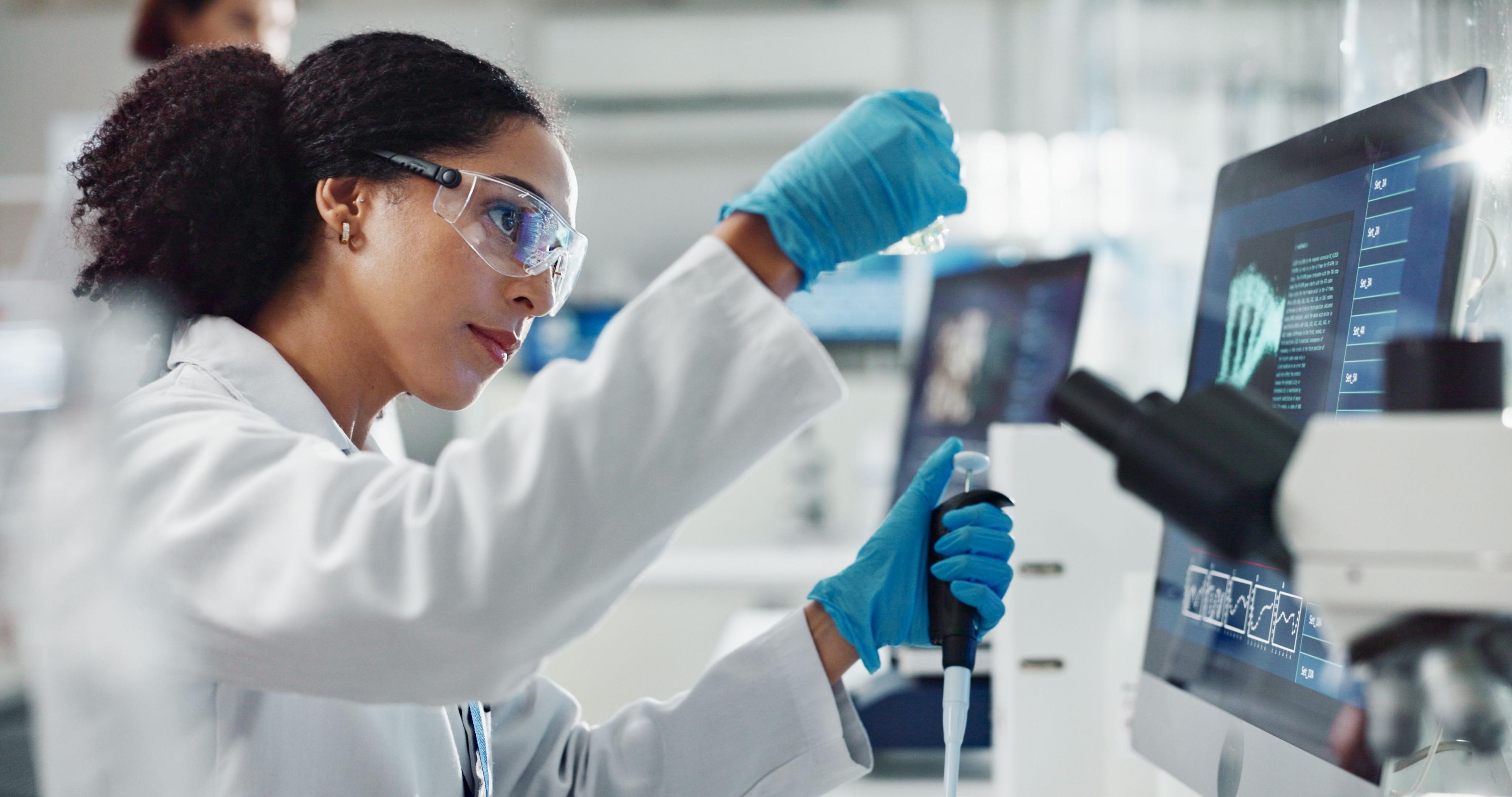 Glass vial, pipette and woman scientist in laboratory for medical study, research or experiment. Test tube, dropper and professional female person with chemical liquid for pharmaceutical innovation. | Image Credit: © peopleimages.com  - stock.adobe.com