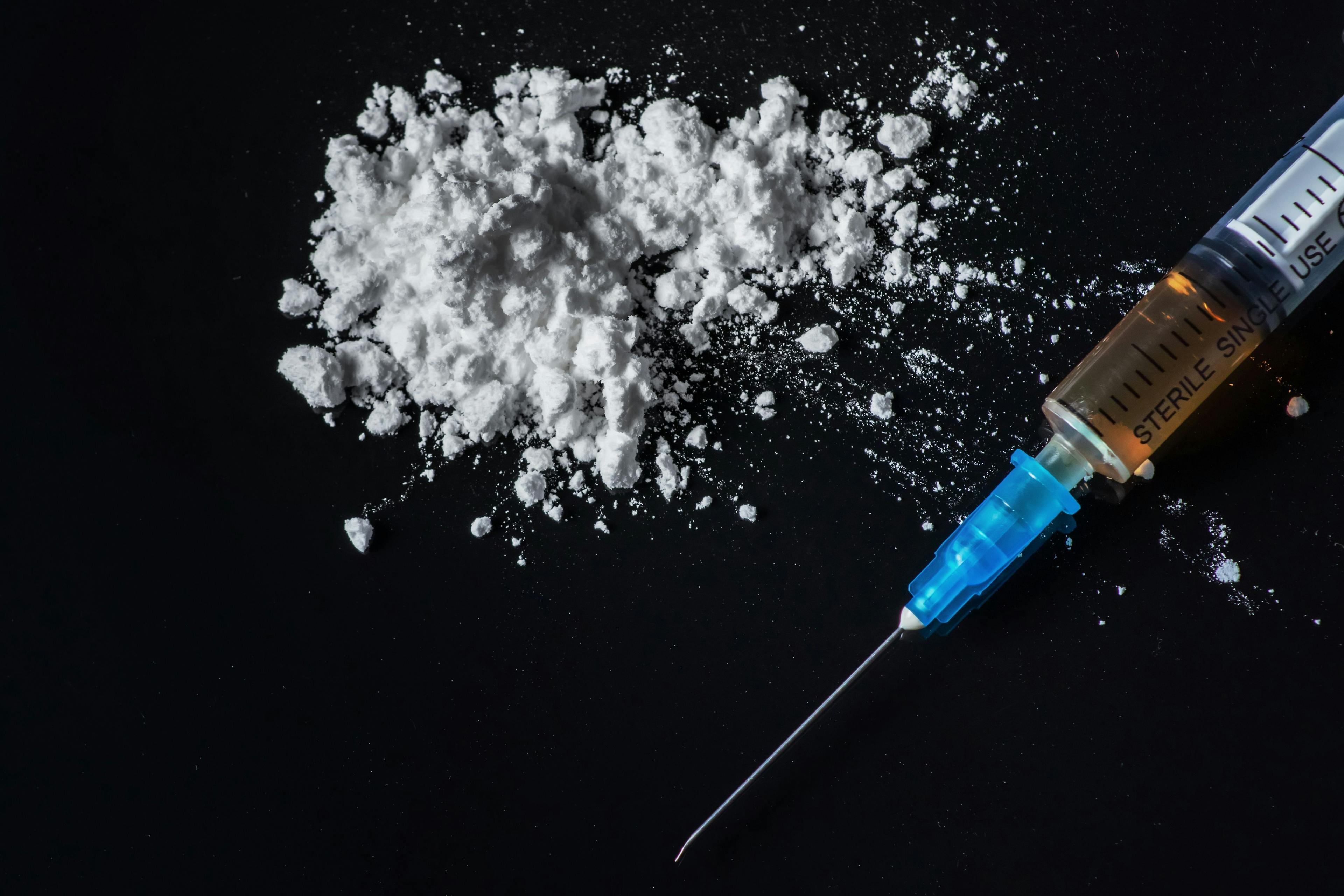 Concept drug addiction. Drugs on a black background. | Image Credit: © eliosdnepr - stock.adobe.com