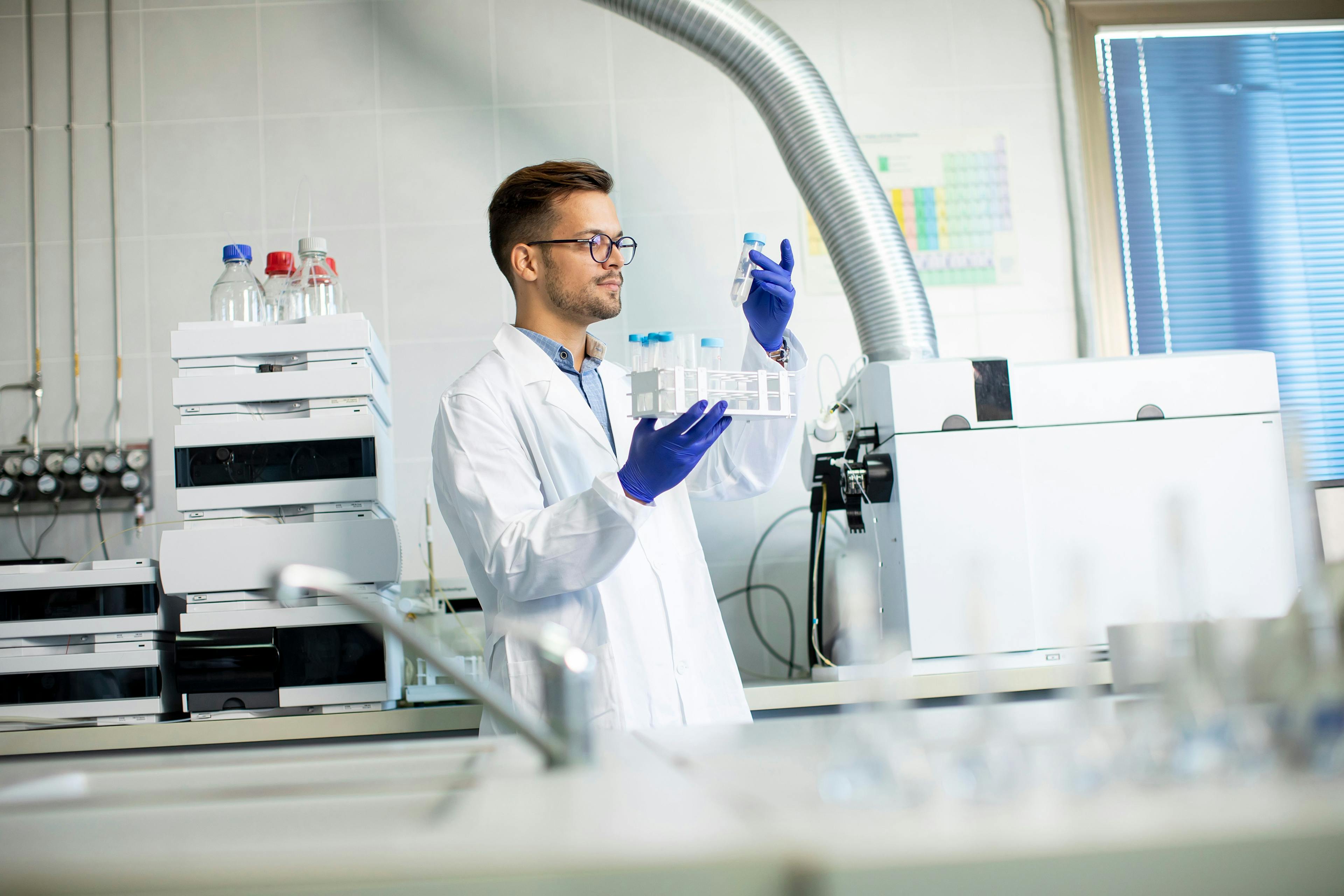 Young researcher workin with chemical samples in laboratory with HPLC system and chromatography equipment | Image Credit: | Image Credit: © BGStock72 - stock.adobe.com.